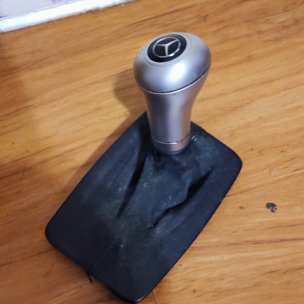 Mercedes Benz OEM W204 C-class Shift Knob Silver, With Black Leather Shift Boot.
